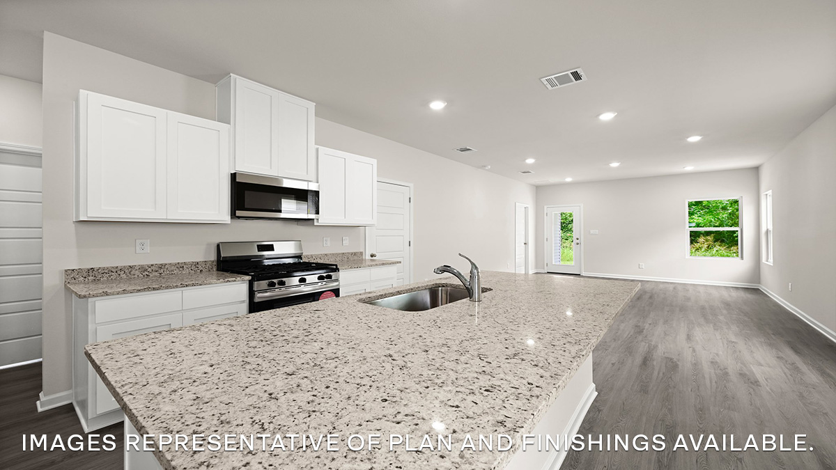 white kitchen island cabinets with stainless steel appliances and stools and access to dining room