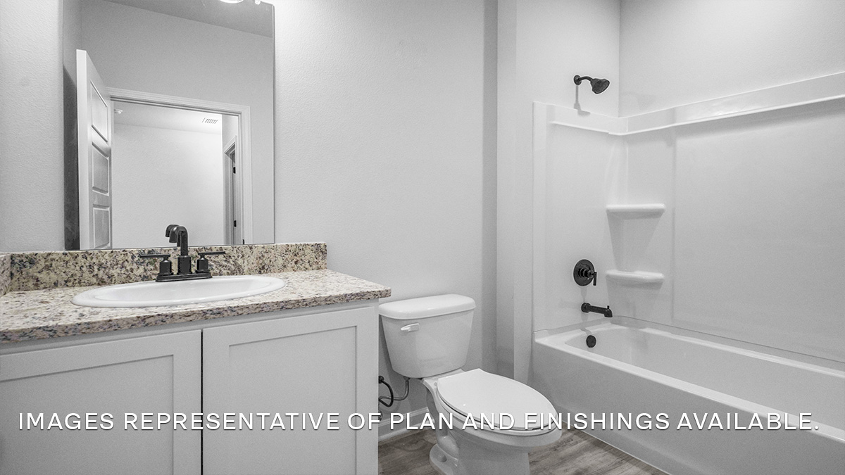 Downstairs bathroom with single vanity mirror and shower tub combo