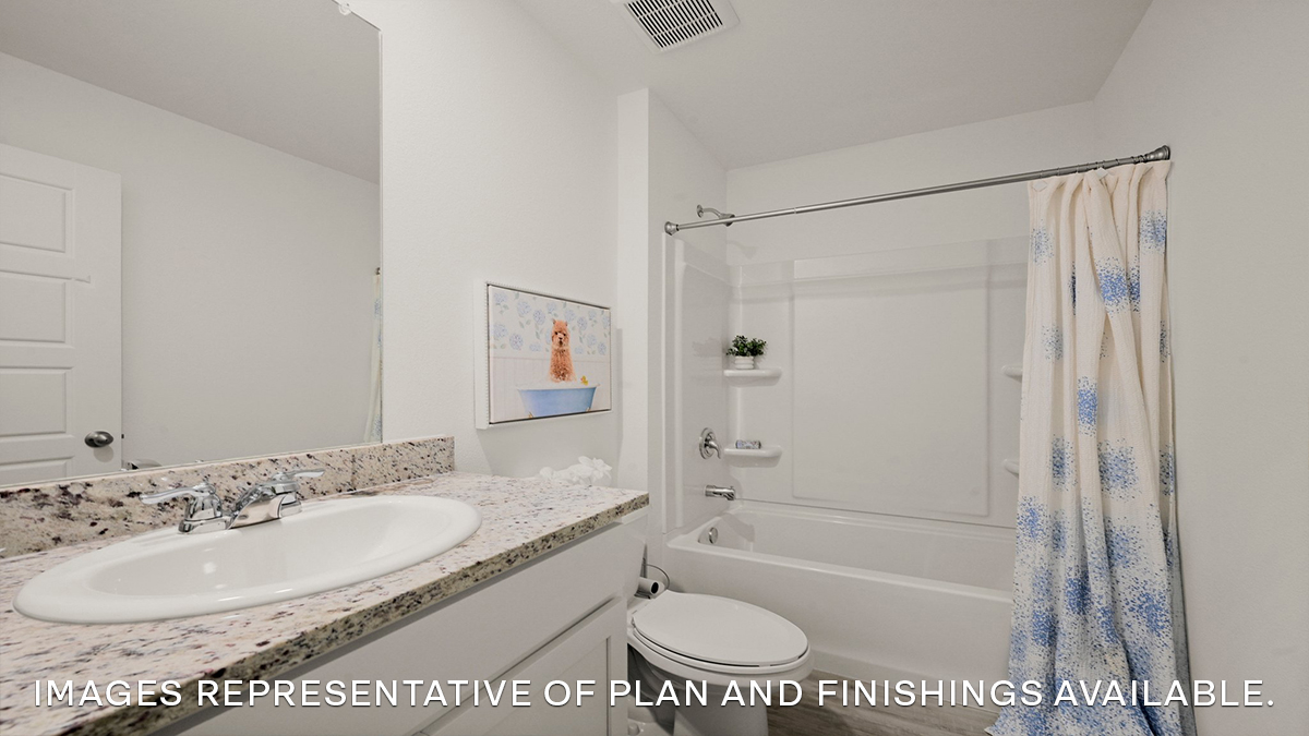 second bathroom with single vanity and toilet and shower tub combo