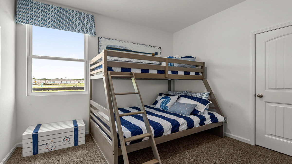 third bedroom with single window and room for a full or queen bed