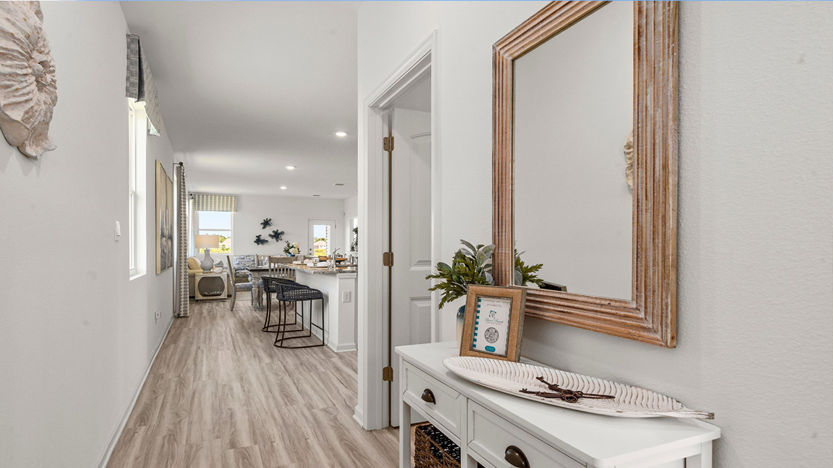 main hallway with access to kitchen and living space