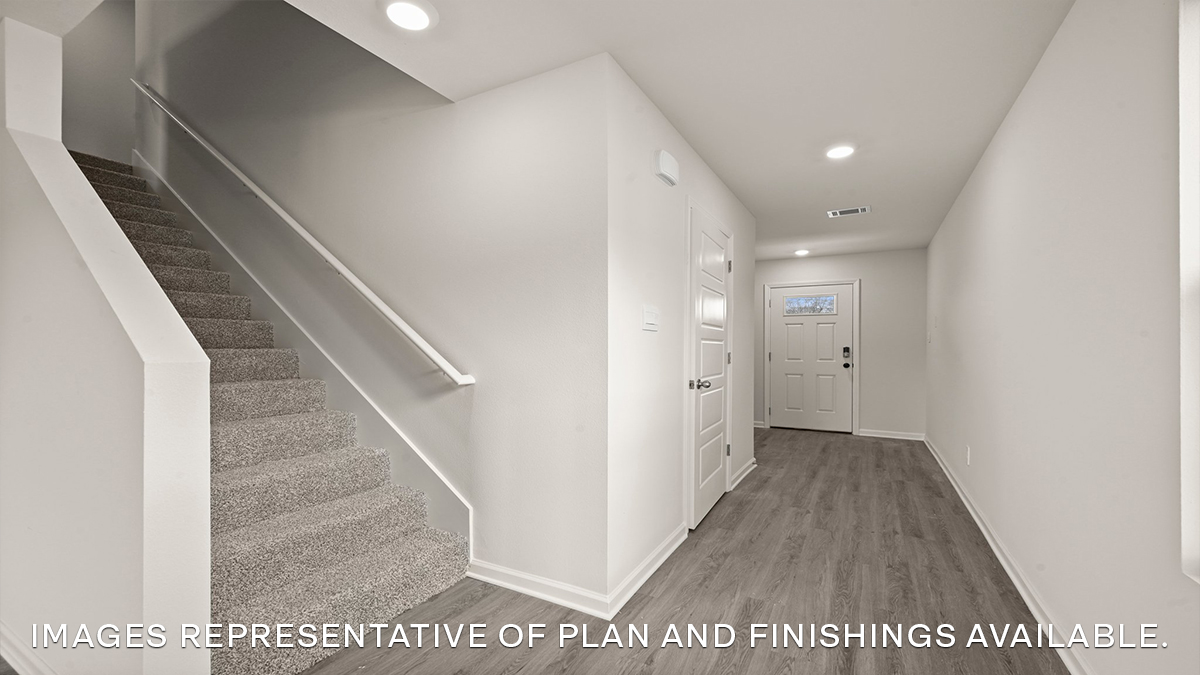 foyer with stairs at entrance of home