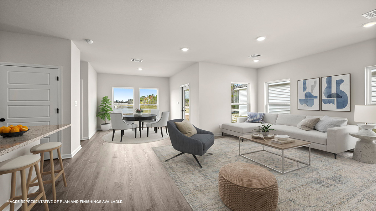 Open-concept living room with dining room and kitchen to the side