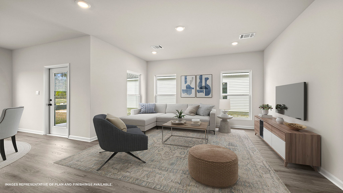 Open-concept living room with dining room and kitchen to the side