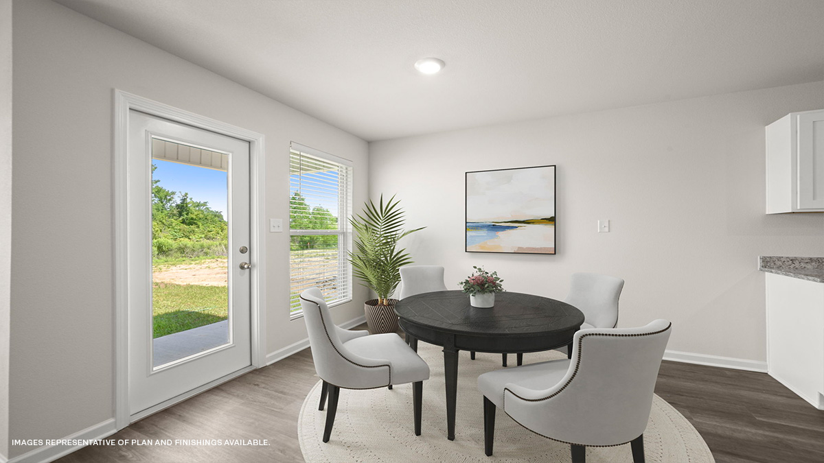 Open-concept dining room with patio access