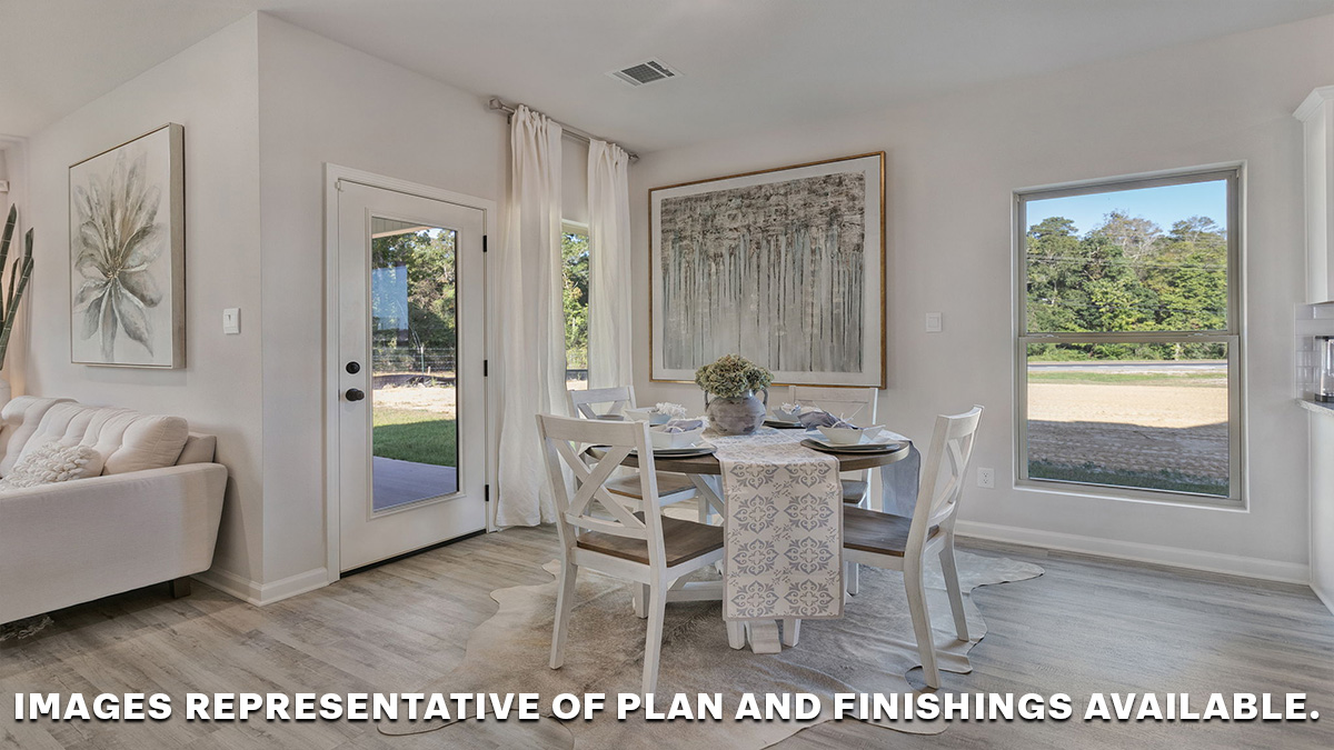 open dining space with access to patio