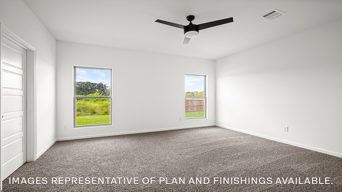 primary bedroom with room for a king-sized bed and rear facing window