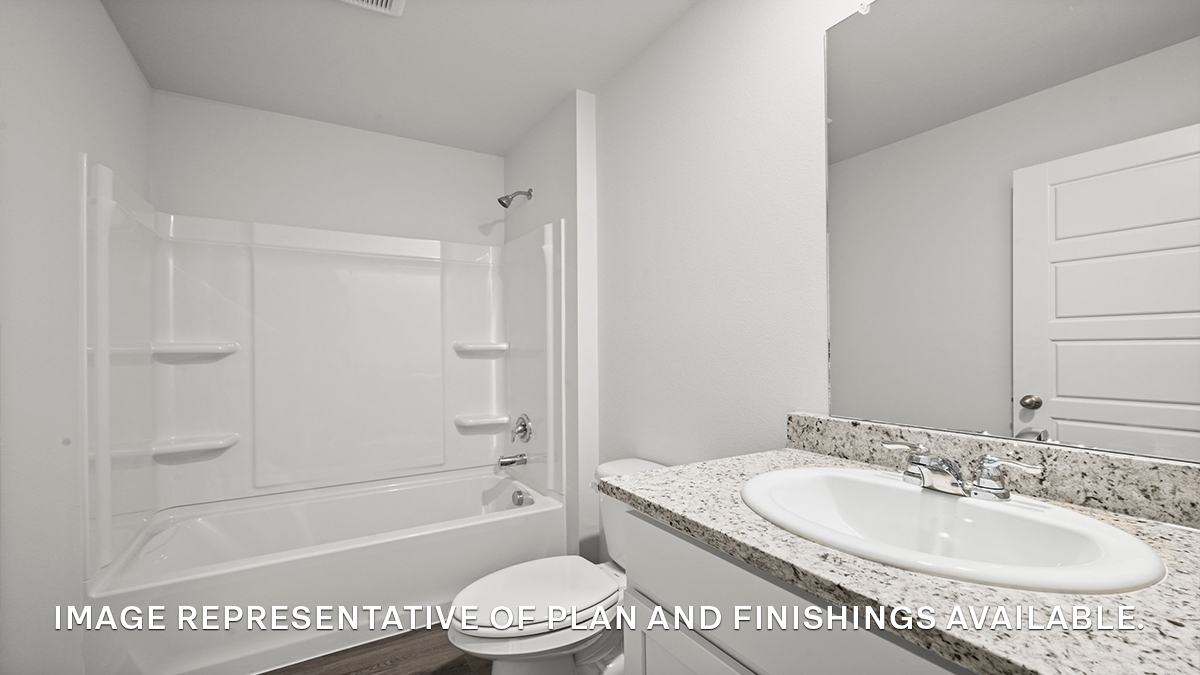 Guest bathroom with single vanity mirror and shower tub combo