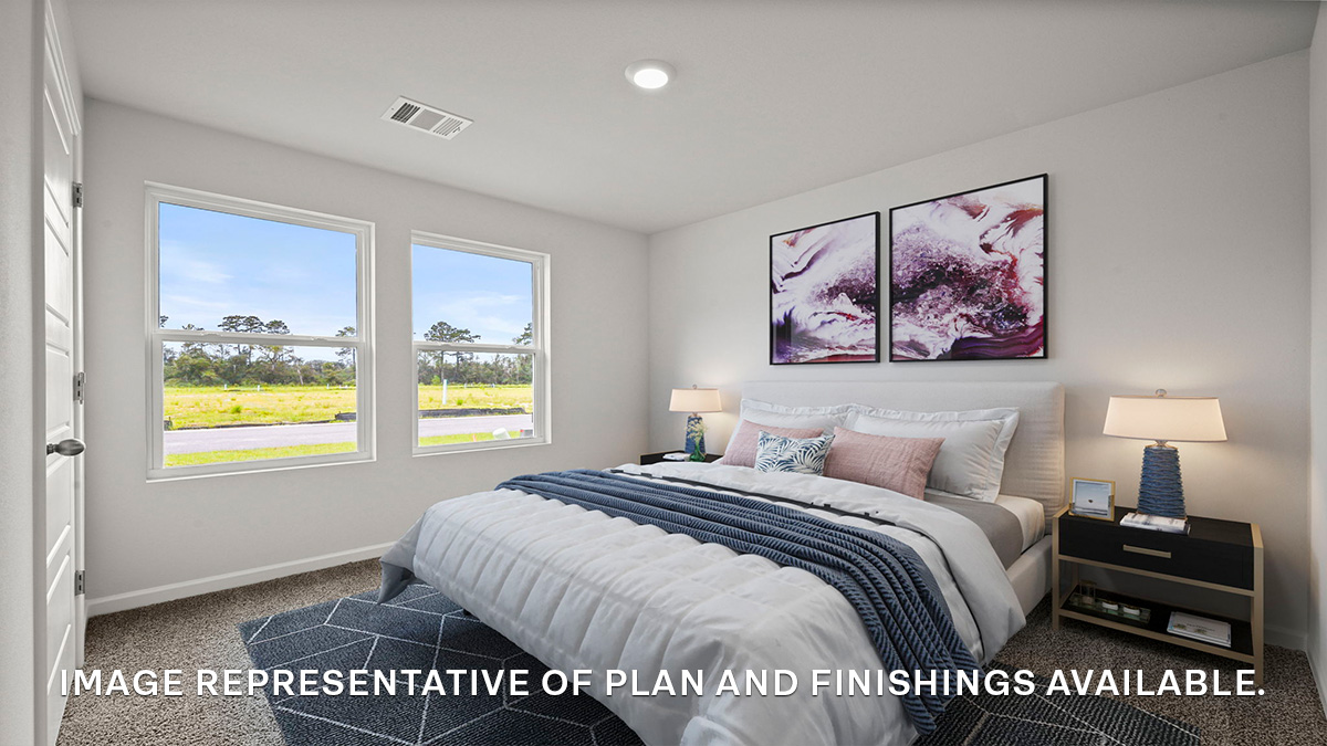 Second bedroom with dual windows and space for full or queen bedroom set