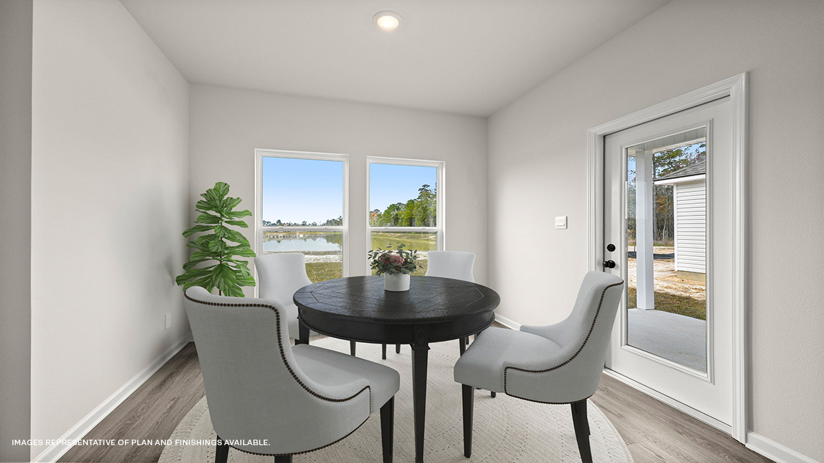 Dining room with dual windows and patio