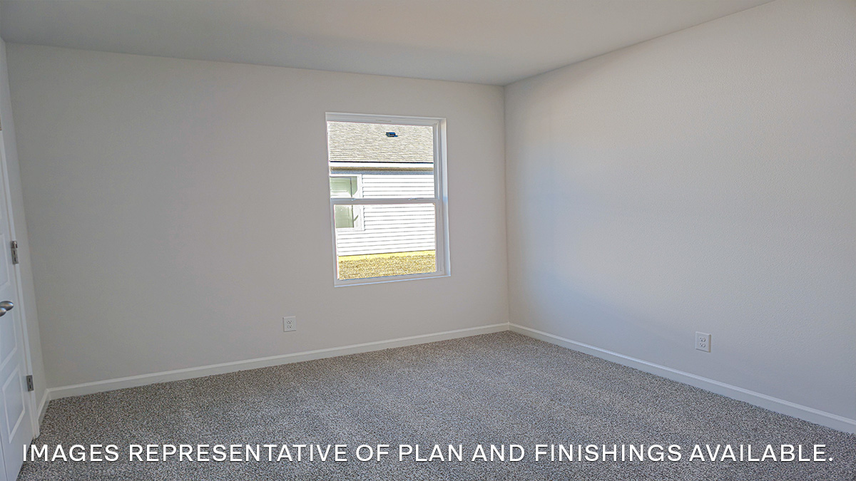 third bedroom with single window and room for up to a queen size bed set