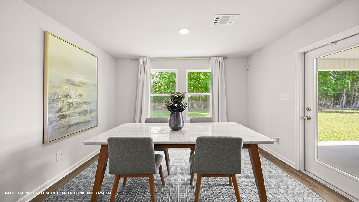 Dining room with dual windows and patio access