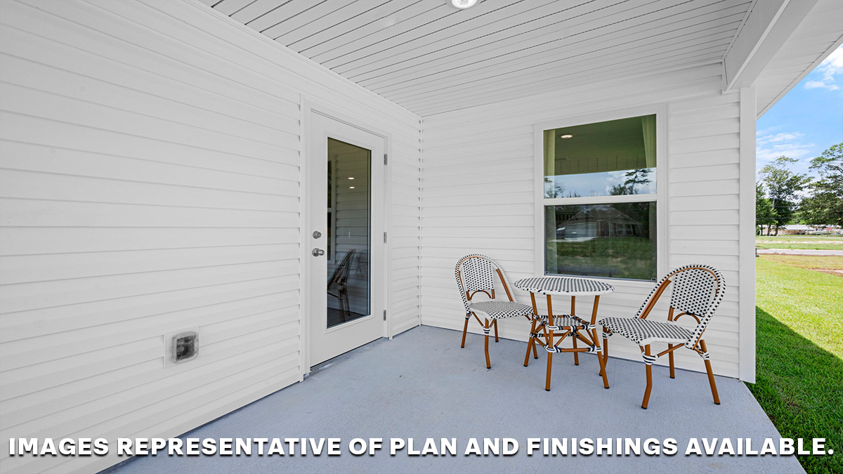 Outside Patio with space for chairs and table and grill looking out to spacious bakyard