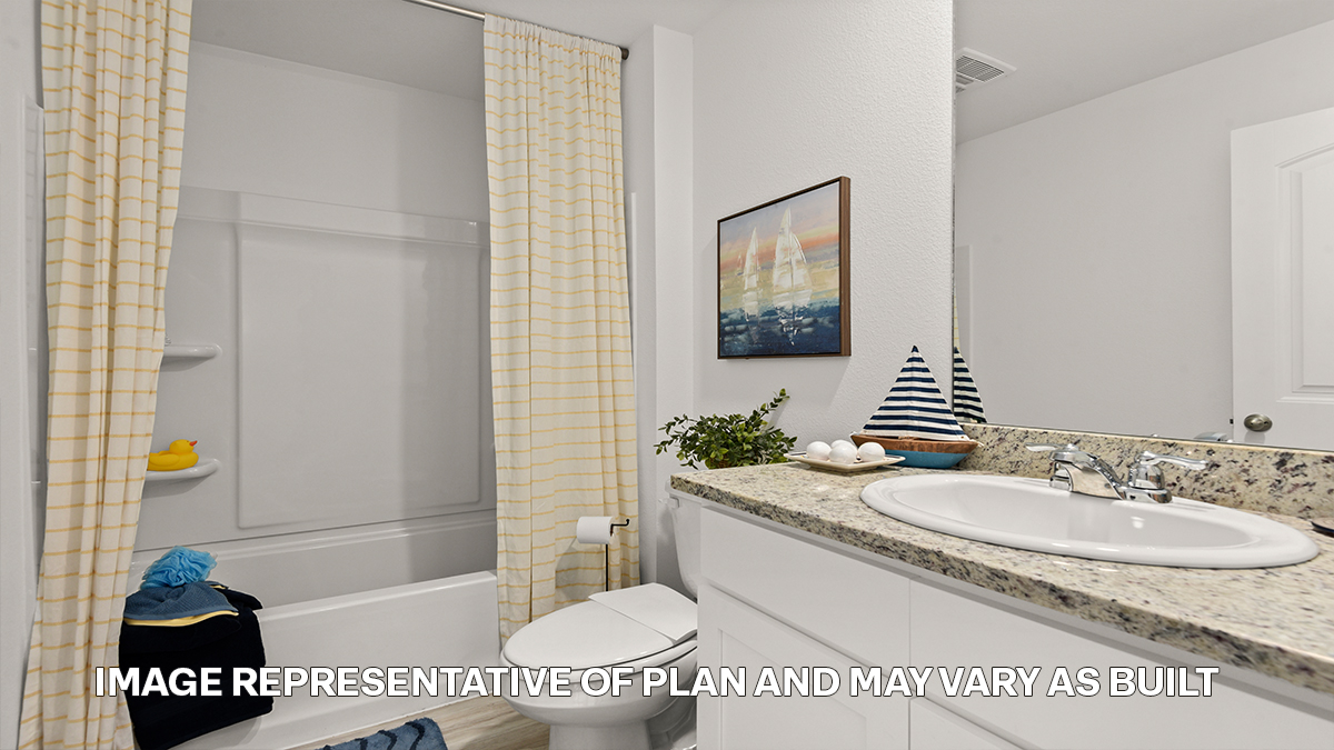 second bathroom with single vanity and toilet and shower tub combo