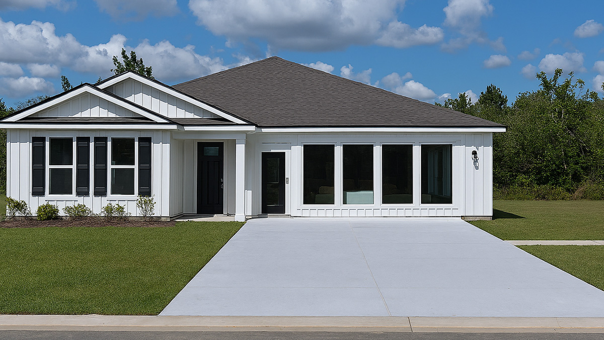 single-story home with white vinyl siding and black front door and shutters with two-car garage