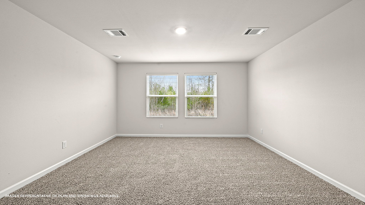 Primary bedroom with space for king size bedroom set and dual windows