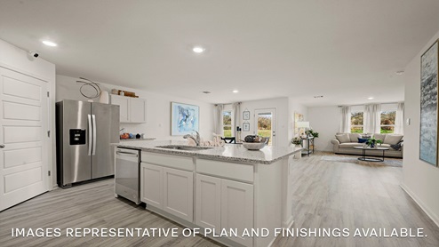 white kitchen island cabinets with stainless steel appliances and stools and access to dining and living room