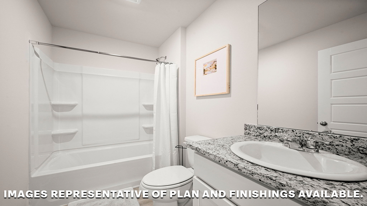 Guest bathroom with single vanity mirror and shower tub combo
