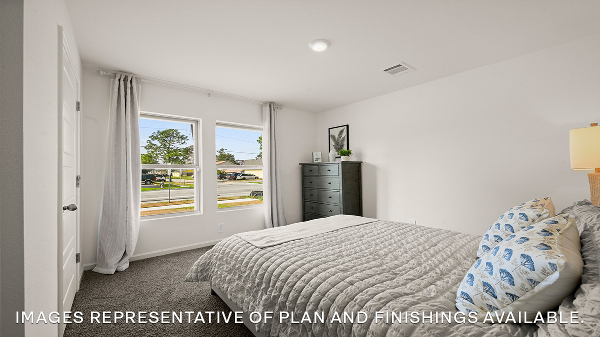 fourth bedroom with window and room for full or queen bed