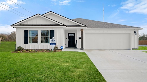 single-story home with white siding and porch and two-car garage