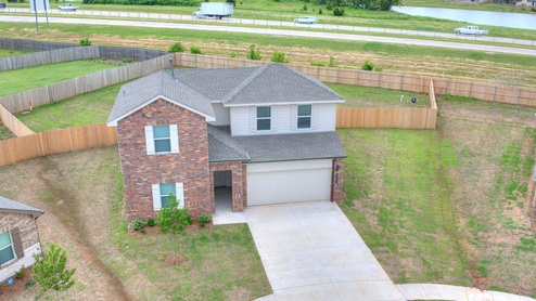 two story exterior with brick