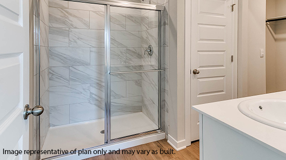 Primary bathroom with enclosed shower