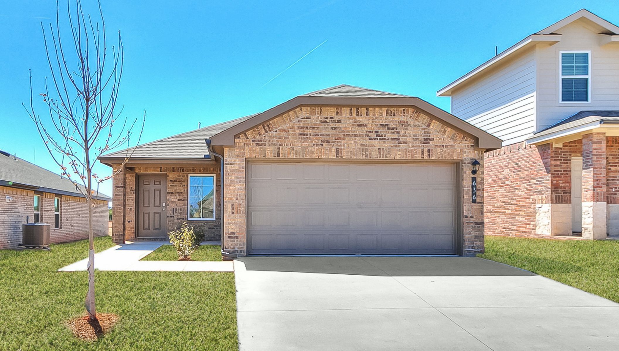 Welcome to the Hanover floor plan, where modern charm meets cozy elegance in the heart of The Enclave at Hefner Crossing Community, nestled in scenic Oklahoma City, Oklahoma. This one-story haven offers 2 bedrooms, 2 baths, and a generous 1050 square feet of living space, perfect for those seeking a warm and inviting retreat.  From the outside, admire the traditional brick or brick and rock exterior, exuding timeless allure and modern curb appeal. Step inside to discover an open concept layout that effortlessly combines style and functionality. The kitchen features painted white shaker-style cabinets, ganite countertops, and stainless steel appliances, creating a welcoming atmosphere that overlooks the dining area and living room, ideal for gatherings and entertaining.  As you explore further, you'll find comfort in every corner. Sink your feet into plush carpeting in the bedrooms, while the main living areas and halls boast durable luxury vinyl wood flooring, adding a touch of rustic charm to your everyday life. Indulge in the luxury of the primary suite, complete with a dual vanity, huge walk-in closet, separate water closet, and a large walk-in shower, ensuring your comfort and convenience.  Experience the convenience of smart home features included in every Hanover floor plan. Schedule a tour today and discover your perfect blend of modern luxury and cozy warmth at The Enclave at Hefner Crossing in Oklahoma City, Oklahoma.