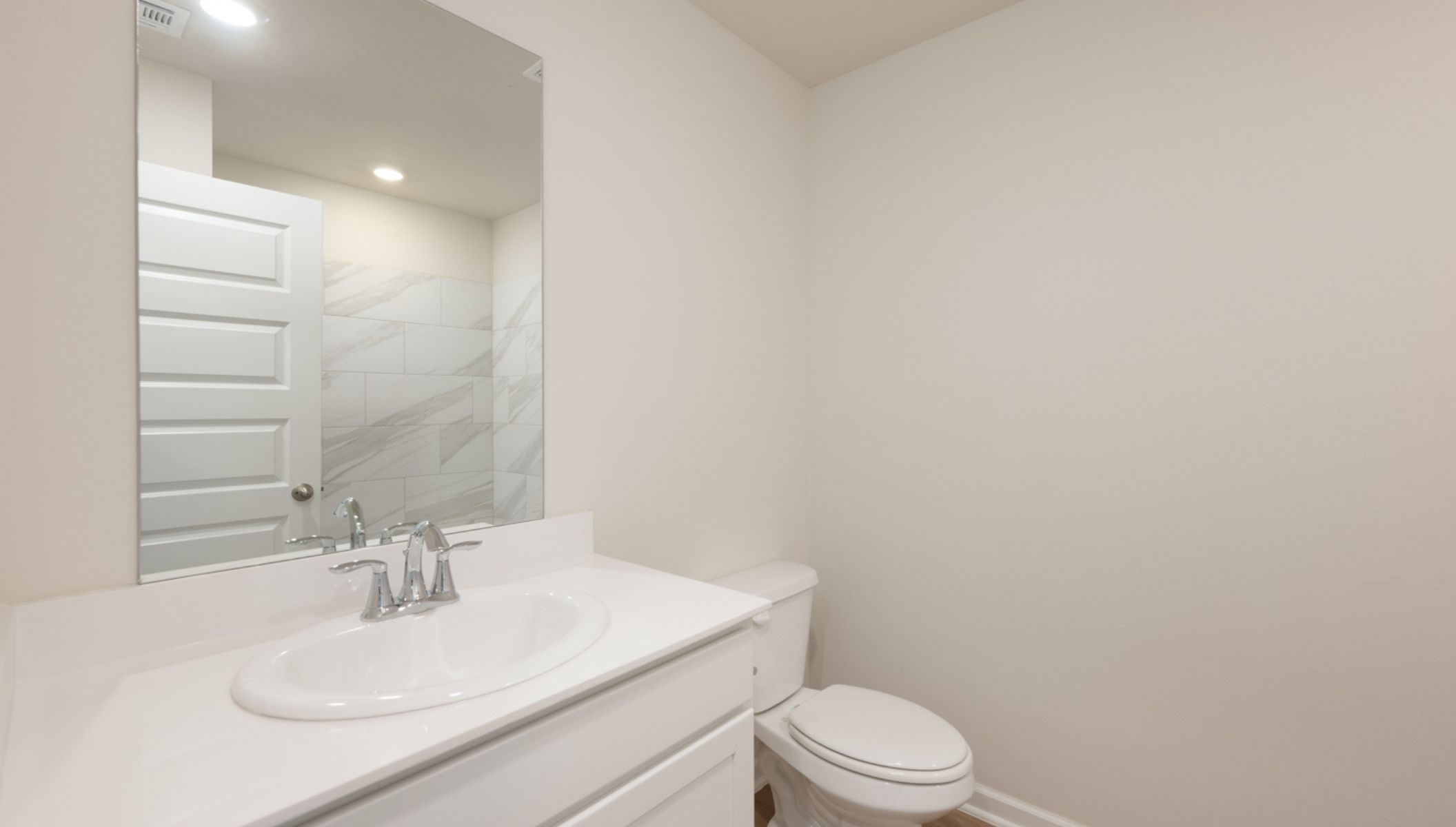 secondary bathroom with single vanity