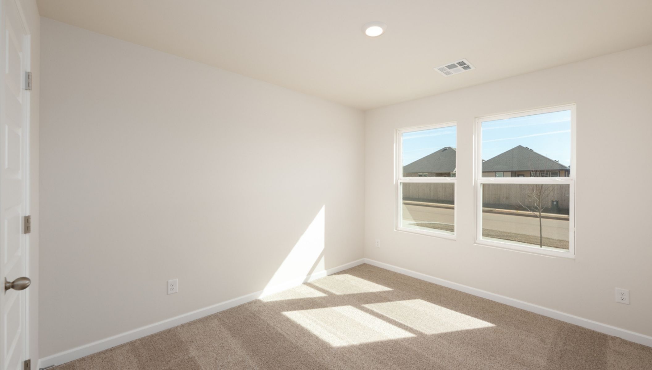secondary bedroom with large window