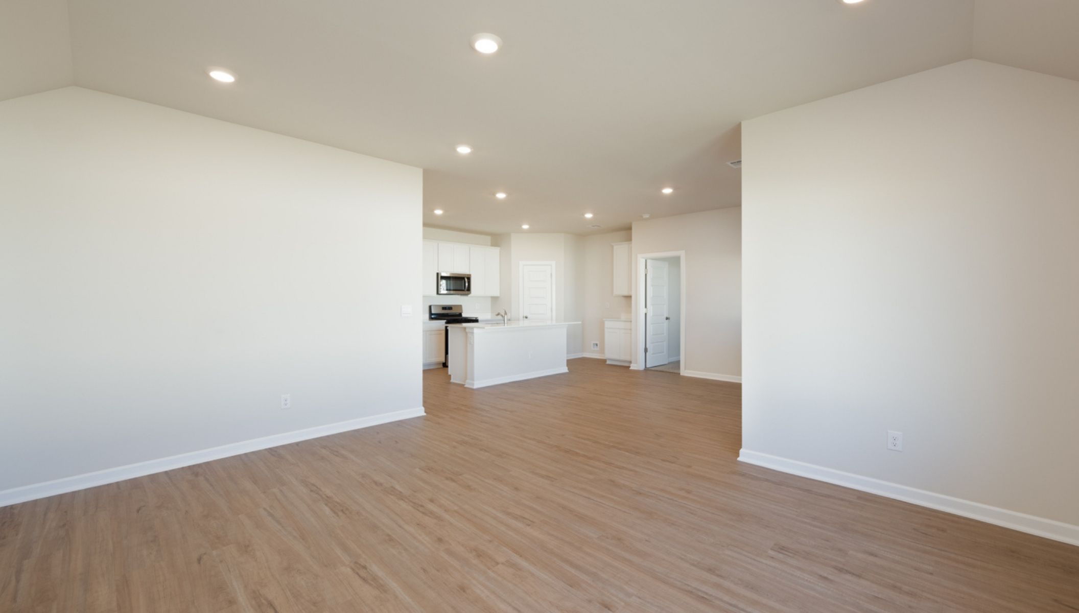 living room opening from kitchen