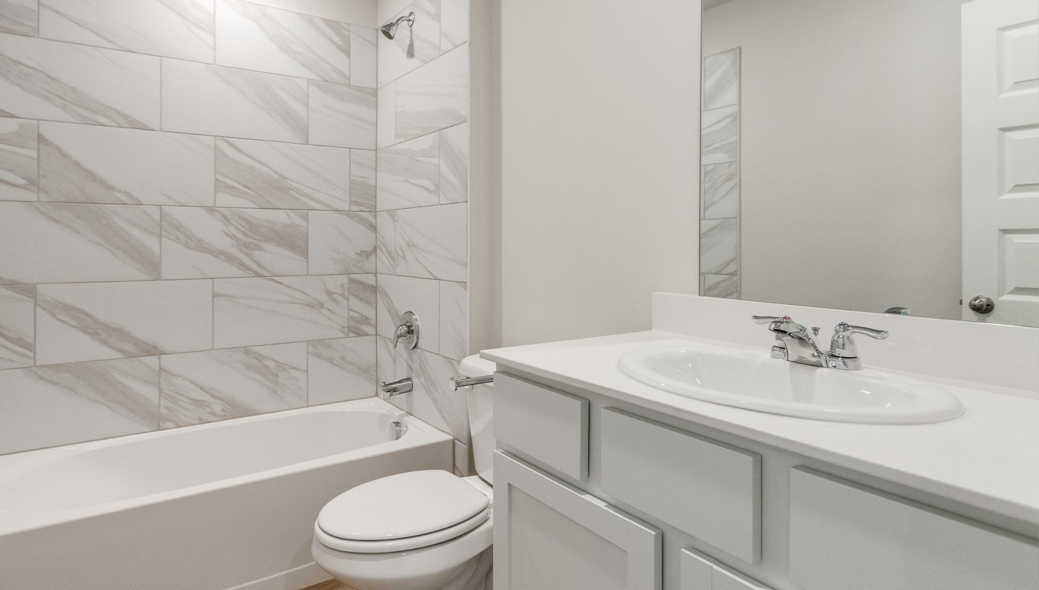 secondary bathroom with shower insert