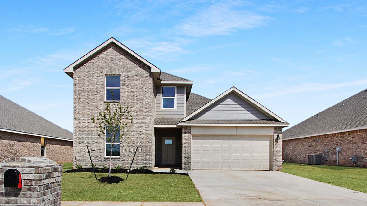 Two-story home rendering with two-car garage.