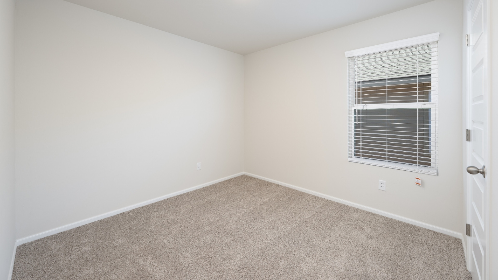 secondary bedroom with window