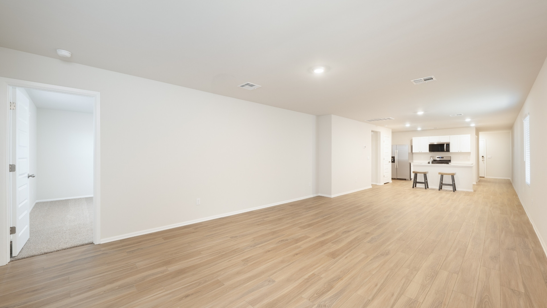 spacious living room with window