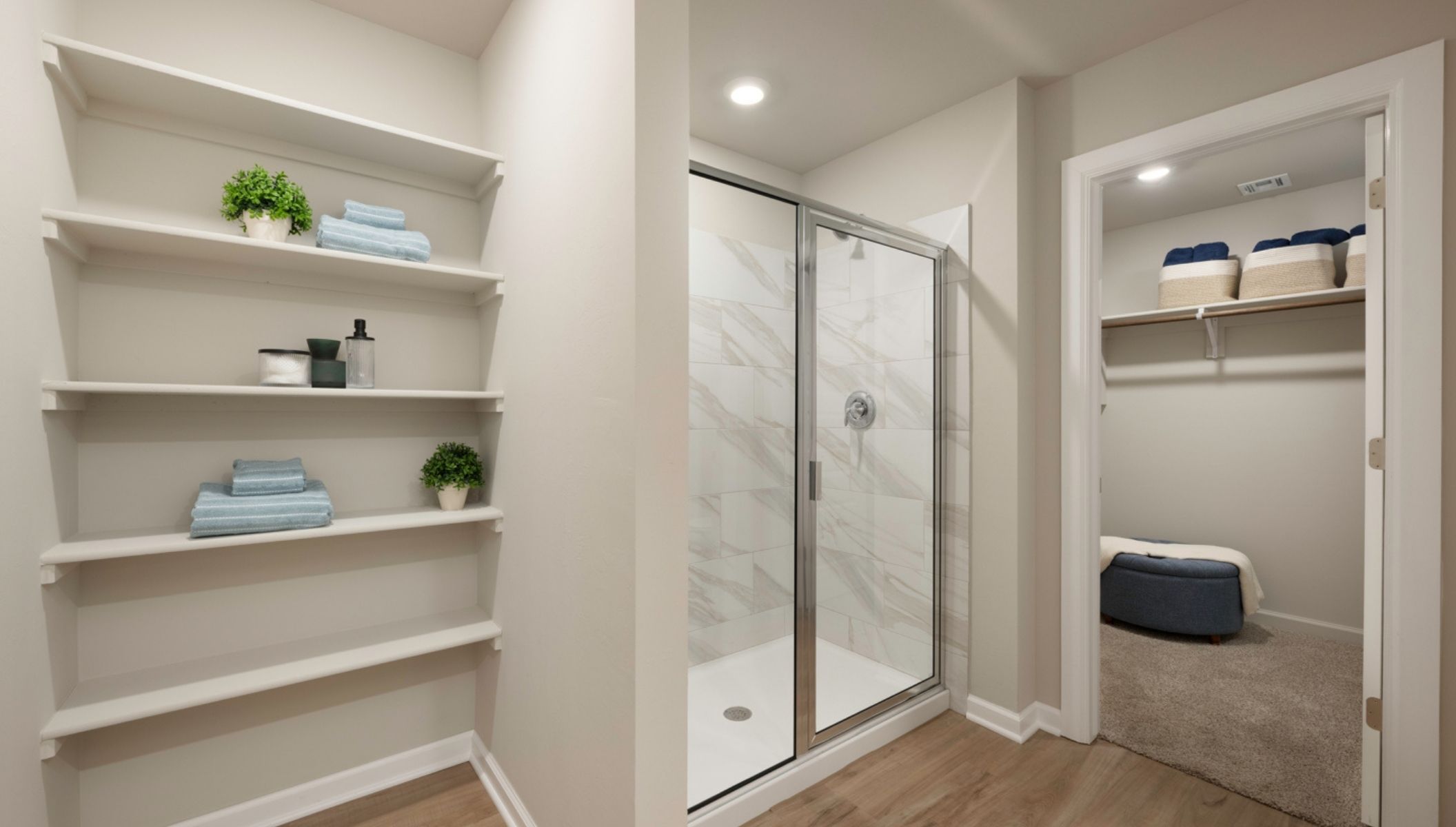 Introducing the Justin floor plan. The Justin floor plan offers a single-story layout with 4 bedrooms, 2 baths, and an expansive 1831 square feet of living space, catering to the needs of modern families.  From the outside, admire the traditional brick or brick and rock exterior, boasting stunning curb appeal that sets the stage for a warm welcome. Step inside to discover an inviting open concept layout, featuring painted white shaker-style cabinets, quartz countertops, and stainless steel appliances, including a gas range, creating a culinary haven that overlooks the dining area and spacious living room.  Gather with loved ones in the large central family room, perfect for entertaining or simply unwinding after a long day. Retreat to the comfort of the bedrooms, with plush carpeting enhancing coziness, while the main living areas and halls showcase durable luxury vinyl wood flooring, marrying style with practicality.  Indulge in the luxury of the primary suite, complete with a dual vanity, huge walk-in closet, separate water closet, and a large walk-in shower, offering a serene sanctuary for relaxation. Plus, enjoy the convenience of smart home features included in every Justin floor plan.