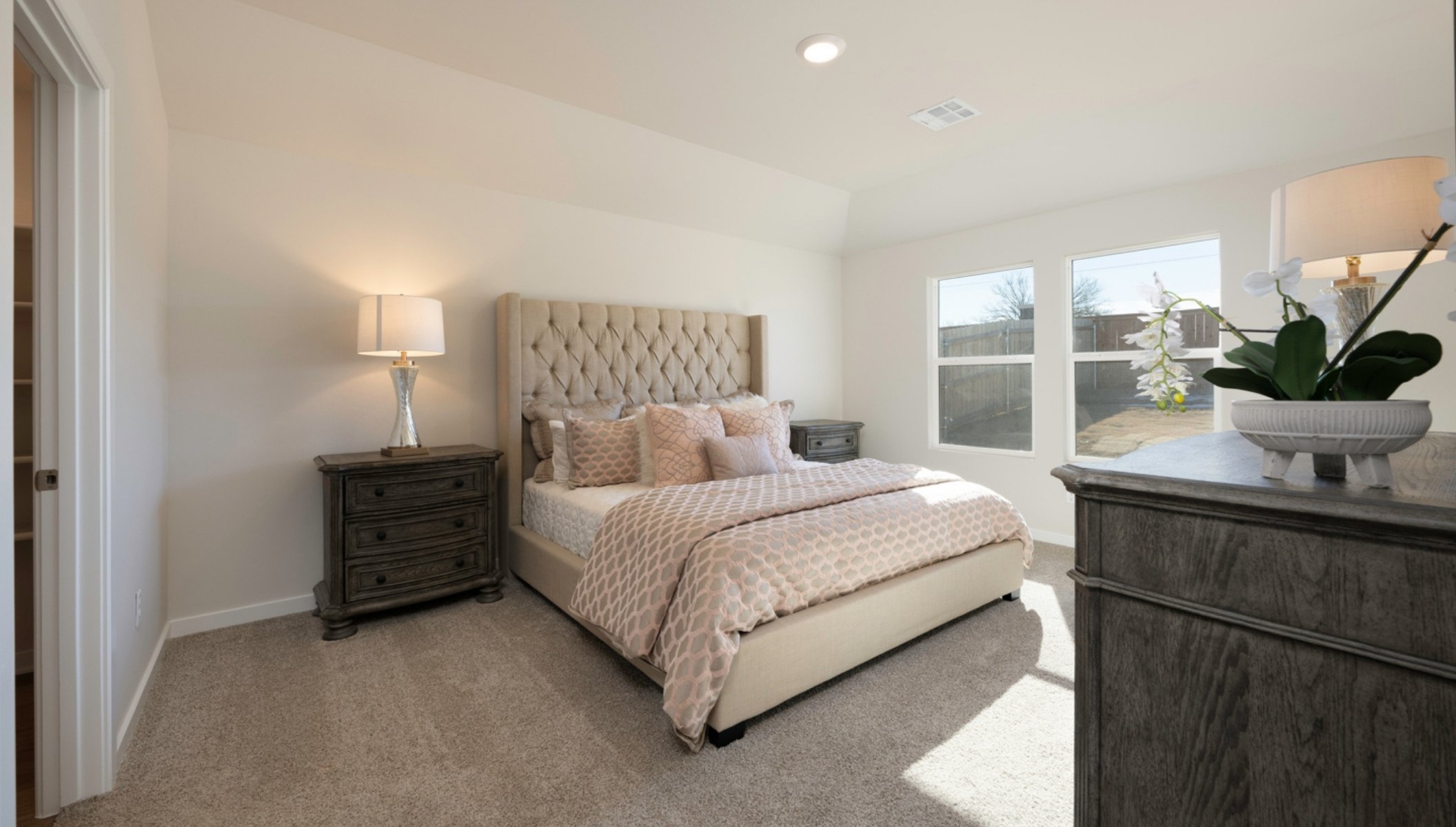 primary bedroom with large window