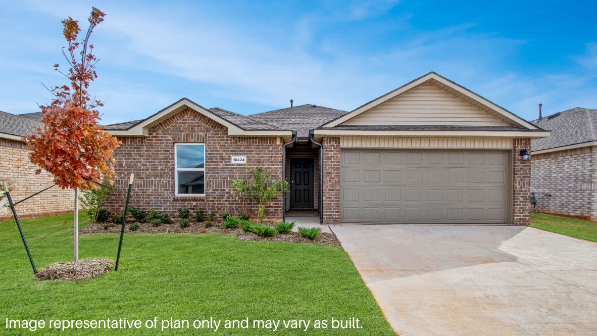 Single-story home with full brick exterior and covered entry and a two-car garage