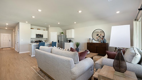 spacious living room with windows