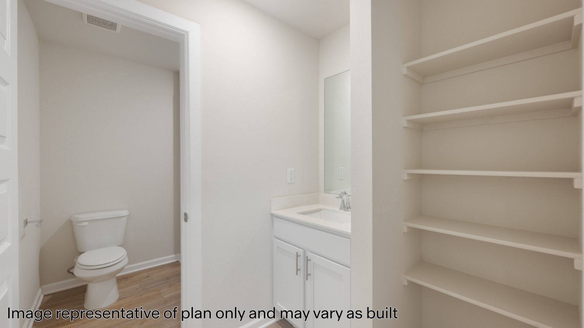 Secondary bathroom with shelving