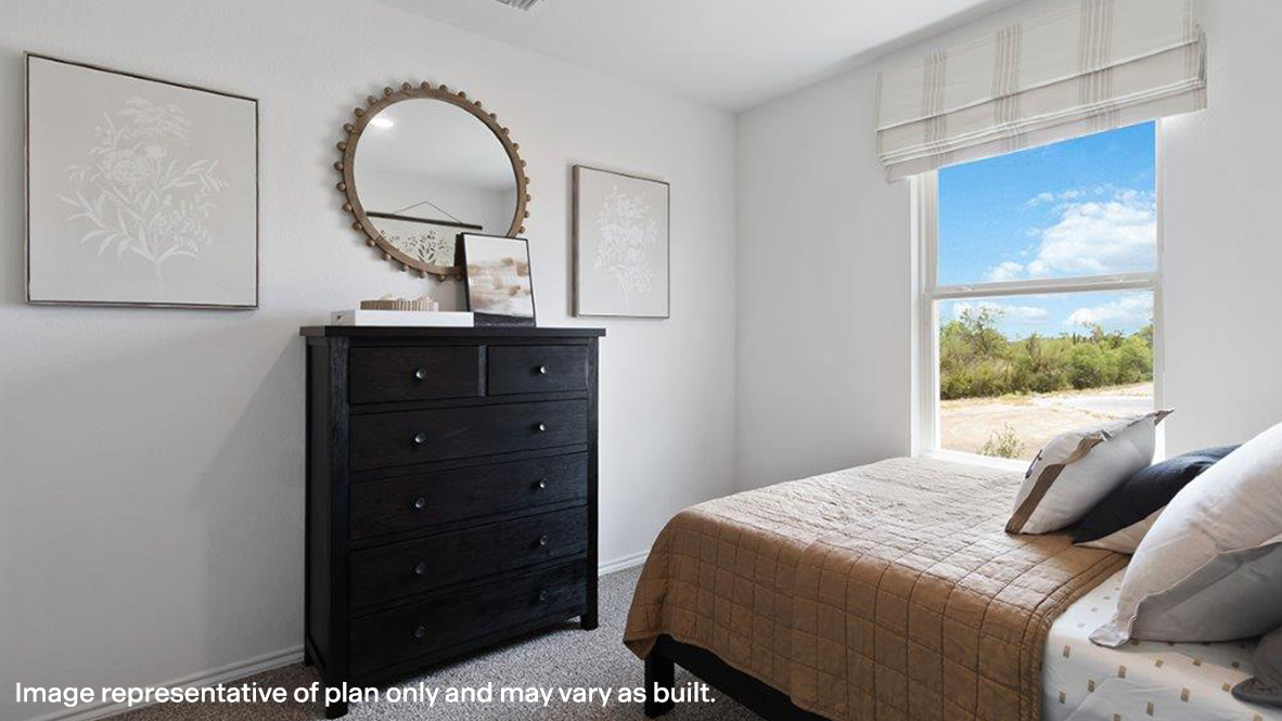 Bedroom featuring carpet floors