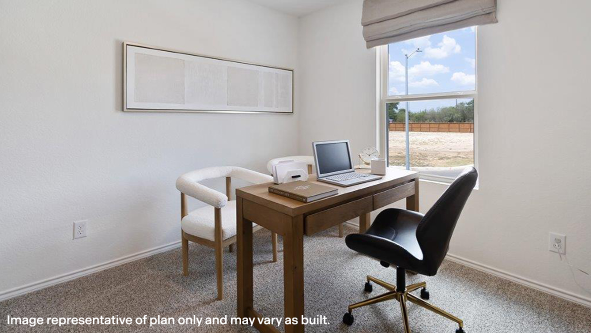 Office area featuring carpet floors and baseboards