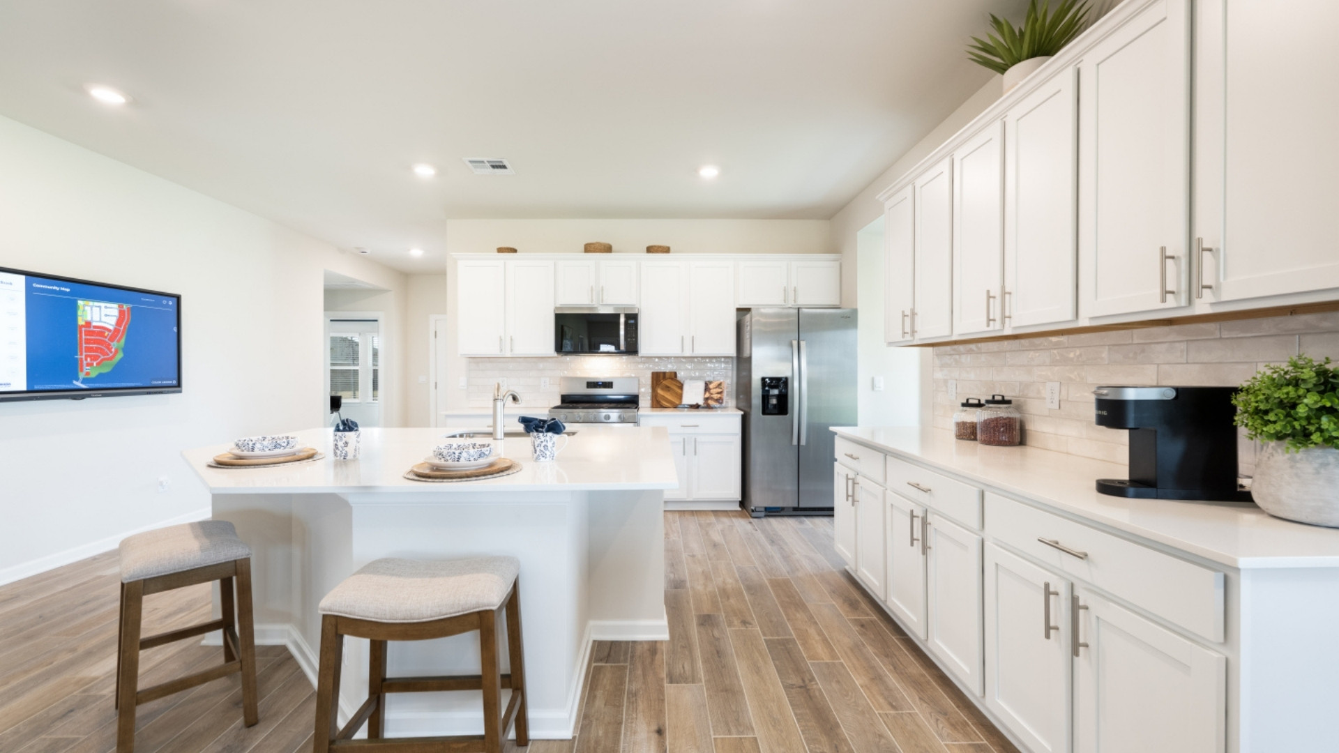 Kitchen with quartz countertops and stainless steel appliances