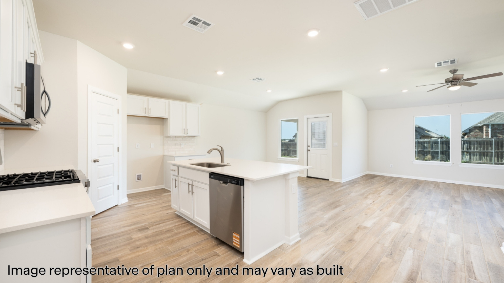 Kitchen with quartz counter and stainless steel appliances