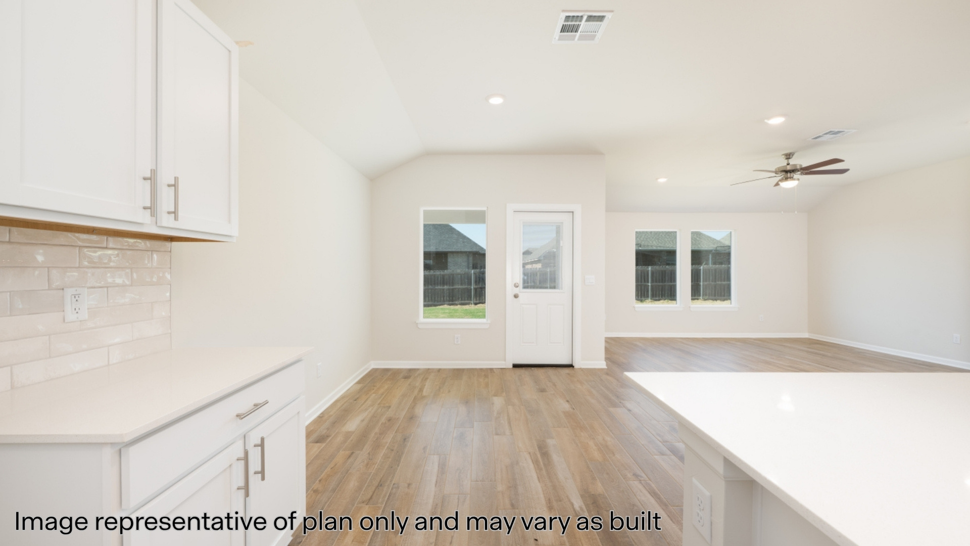Kitchen with quartz counter and stainless steel appliances