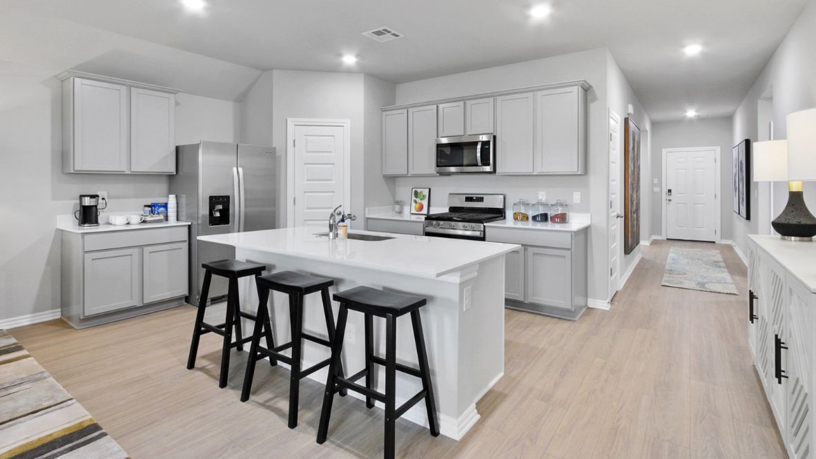 New home in Piedmont, OK by D.R. Horton. New homes with kitchen island and open living space