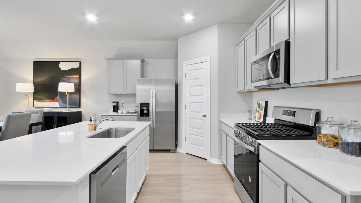 New home in Piedmont, OK by D.R. Horton. New homes with kitchen island and open living space