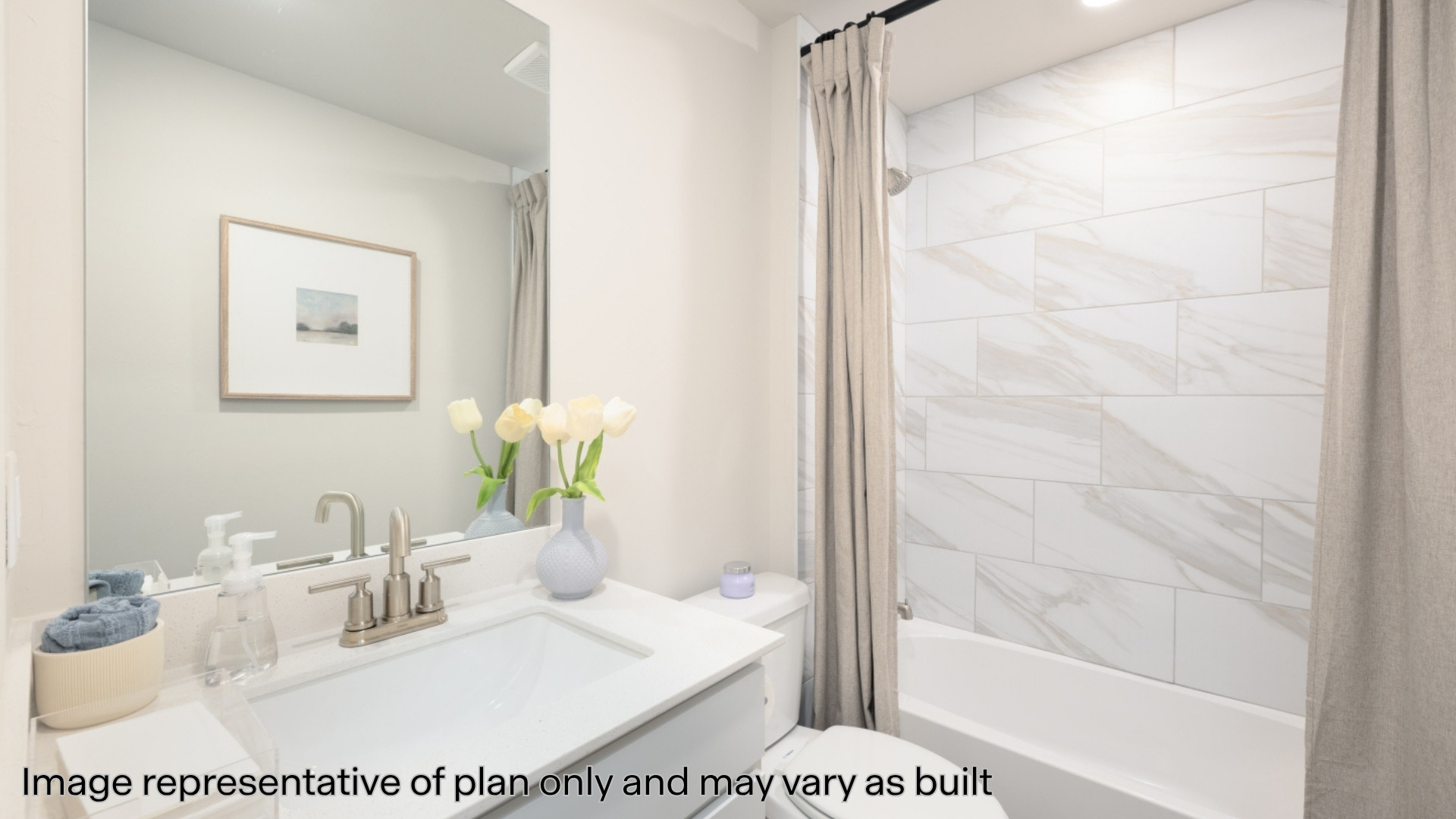 Bathroom with shower / tub combo with curtain and vanity