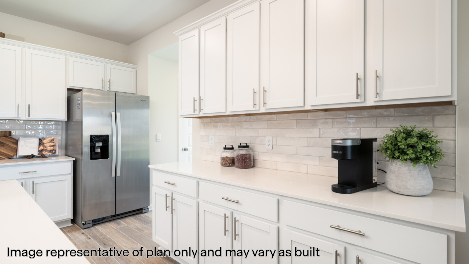 Kitchen with quartz countertops and stainless steel appliances