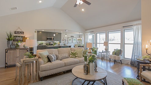 living room with wall of windows