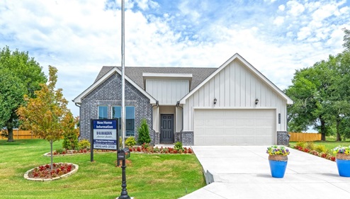 single story home with brick and siding